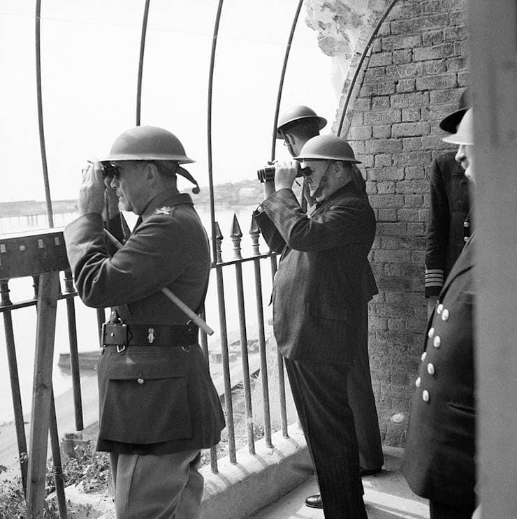 Winston Churchill viewing activity in the Channel from an observation post at Dover Castle during his tour of defences, 28 August 1940.